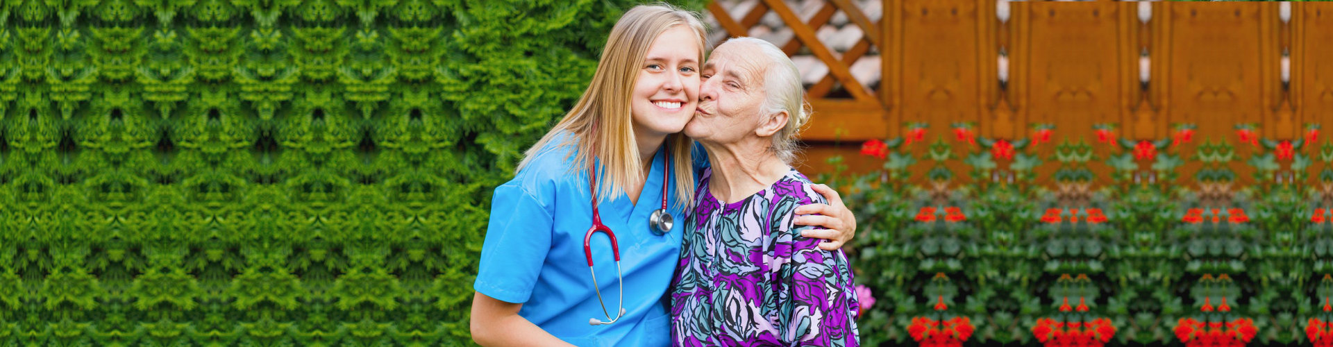 senior woman kissing her nurse